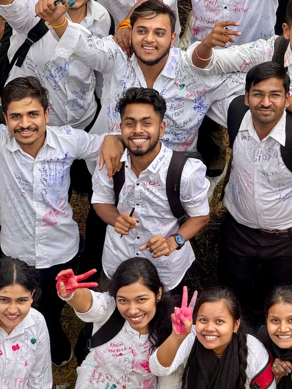 Happy college students celebrating together